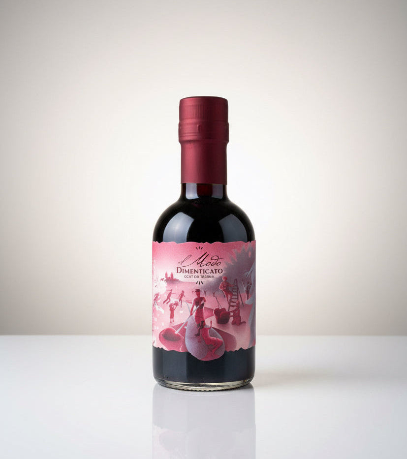 Bottle of red wine with a pink label on a white background