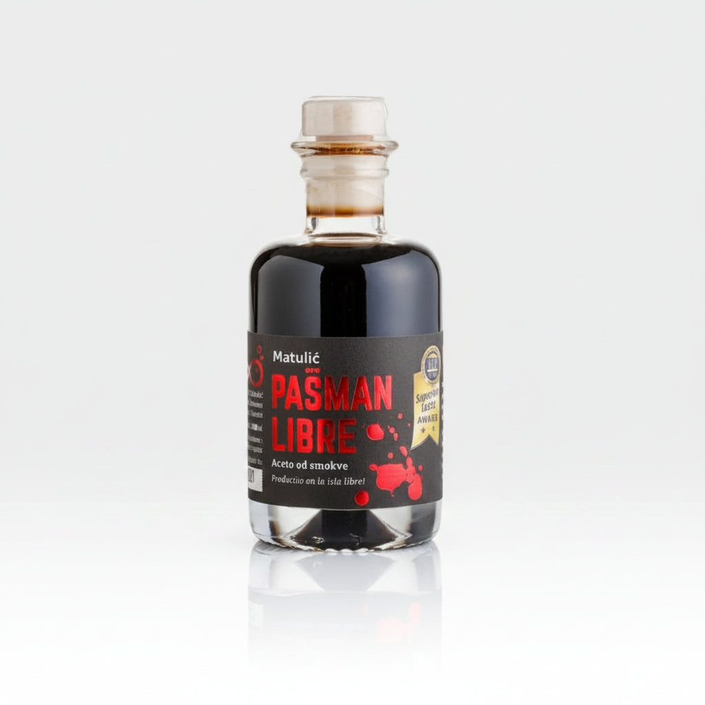 Bottle of Pašman Libre with figs and mint on a white background