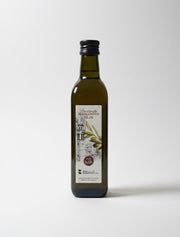Bottle of olive oil with a label on a white background