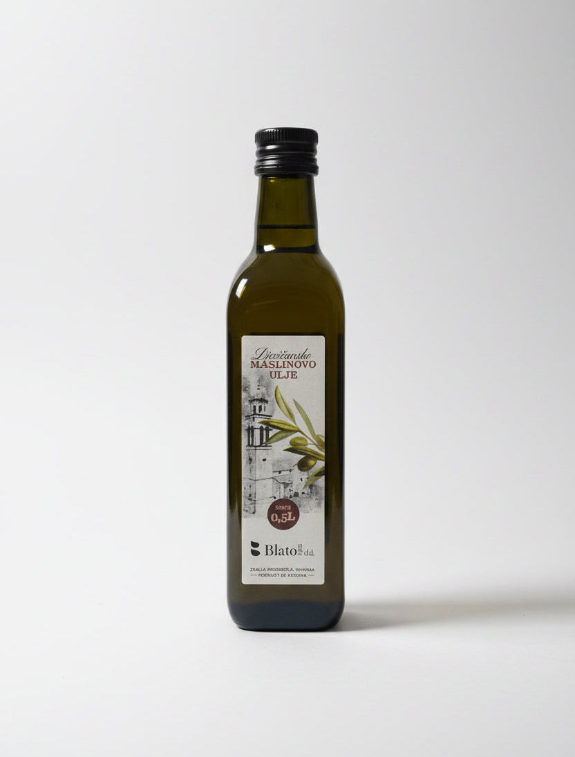 Bottle of olive oil with a label on a white background