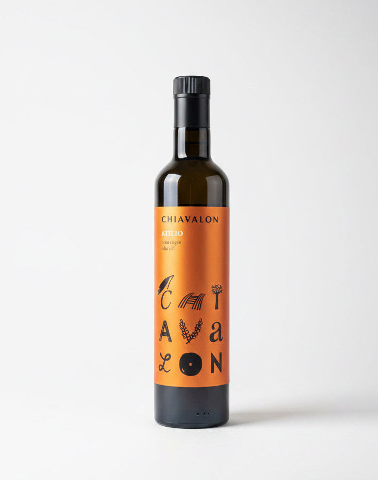 Wine bottle with an orange label on a white background