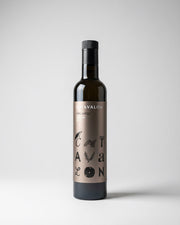 Wine bottle with a label on a white background