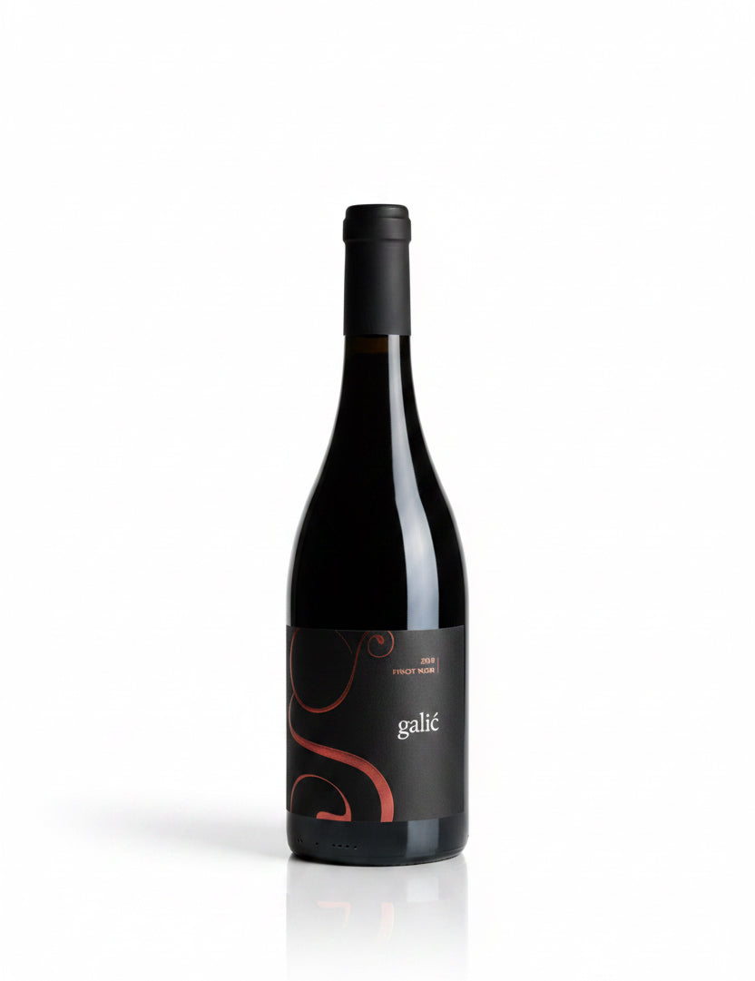Wine bottle with a black label on a white background