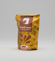 Gold Coast natural cocoa powder package on a white background