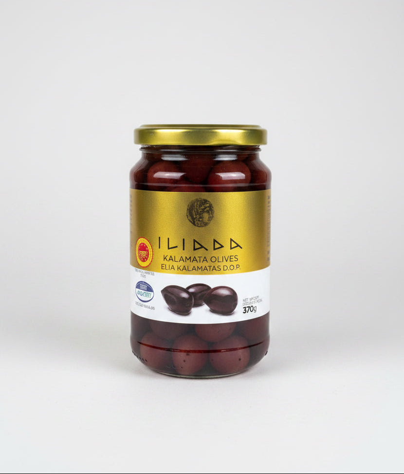 Jar of Iliada Kalamata Olives on a white background