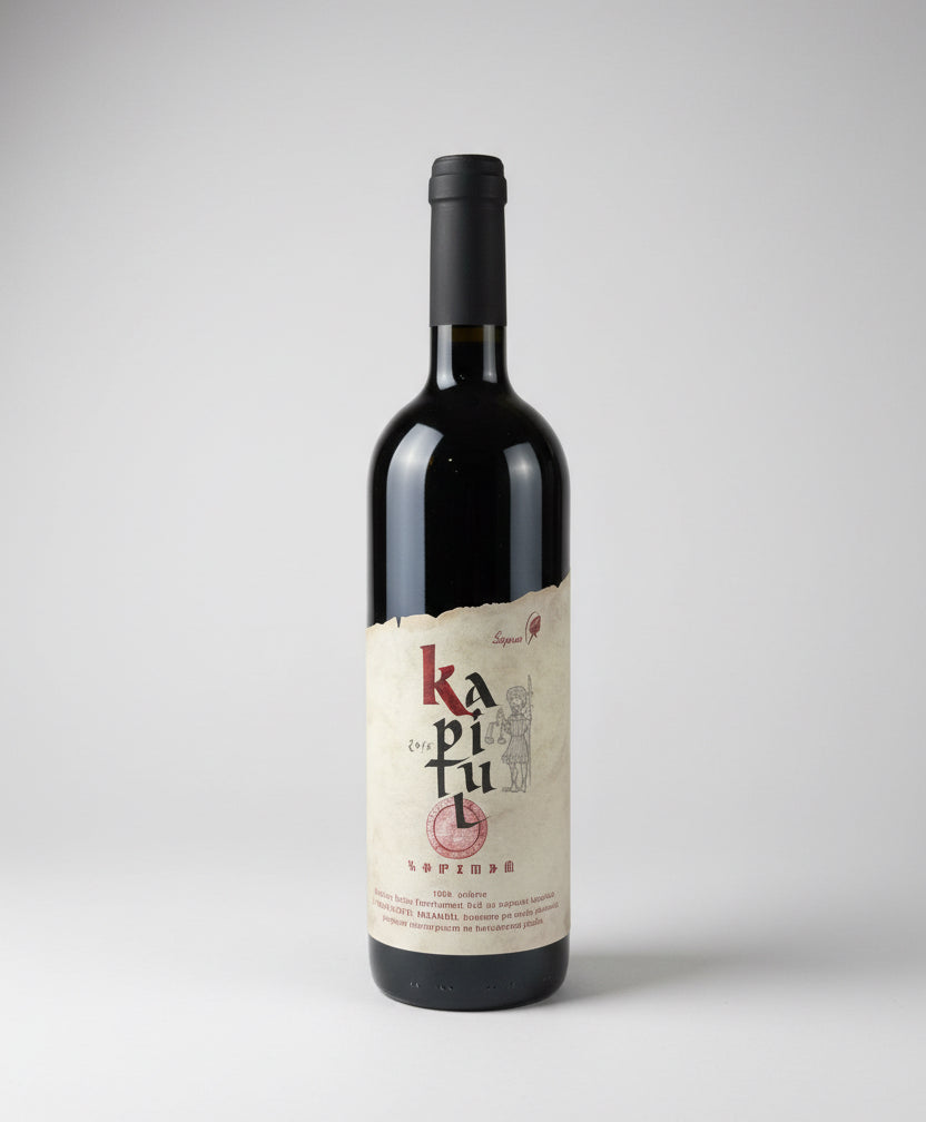 Wine bottle with a label on a white background