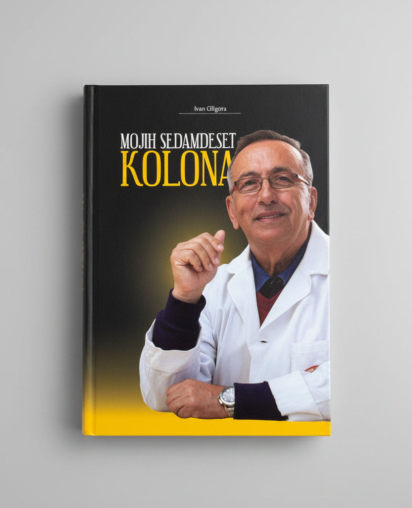 Book titled 'Mojih sedamdeset kolona" with a person on the cover, placed on a wooden surface.