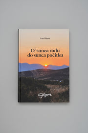 Book titled 'O' sunca rodu do sunca pocitku' by Ivan Gigora on a wooden surface