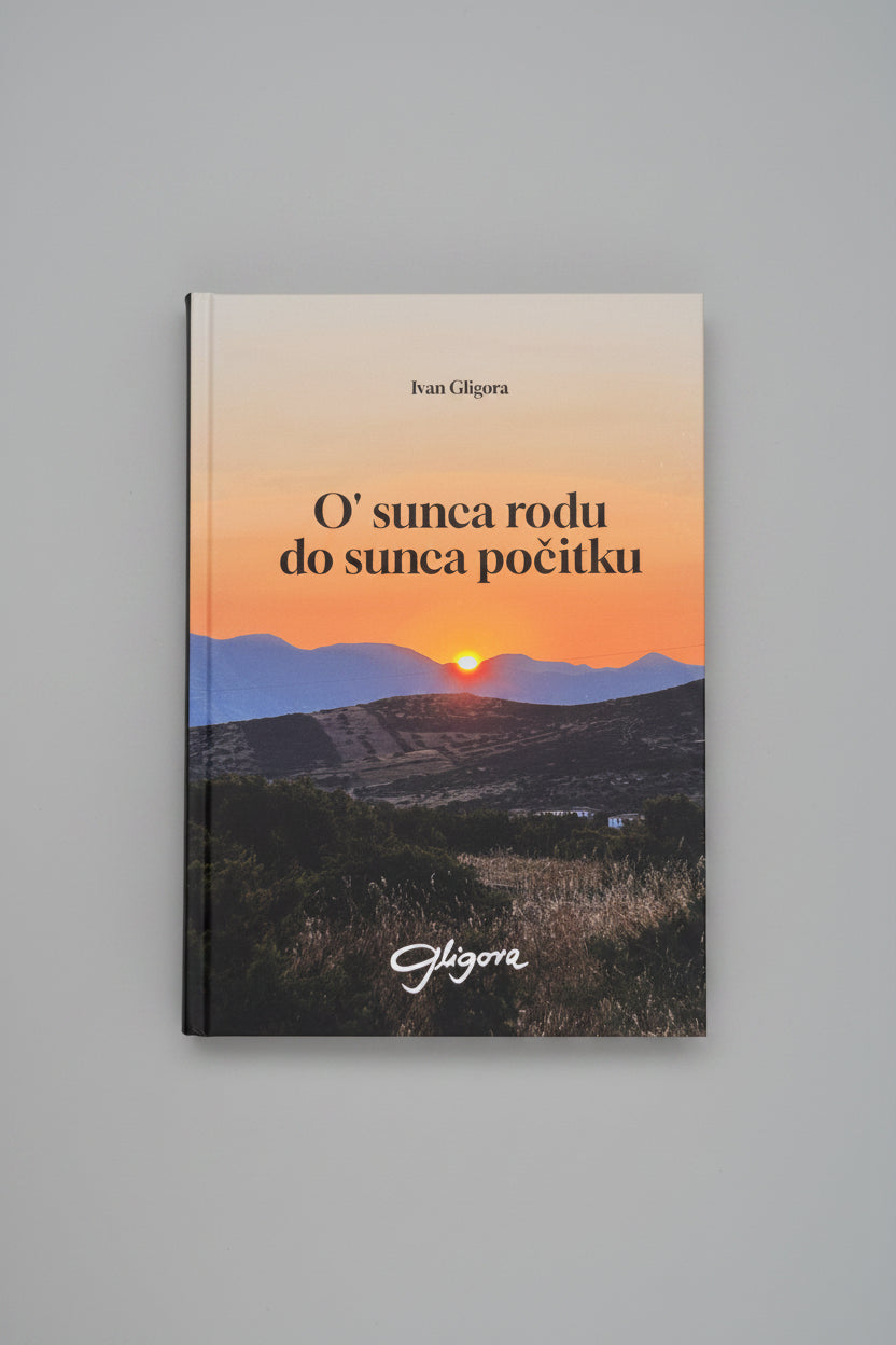 Book titled 'O' sunca rodu do sunca pocitku' by Ivan Gigora on a wooden surface