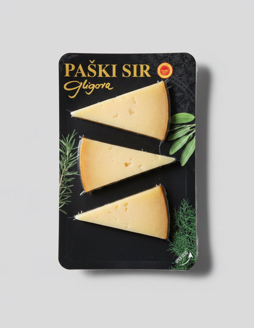 Paski Sir Gigore cheese packaging with three triangular pieces on a black background.