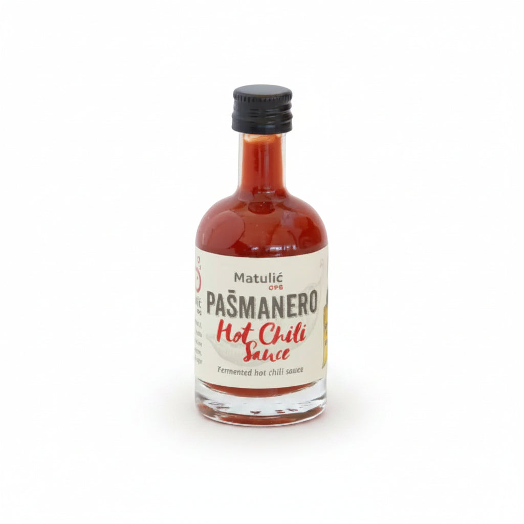Bottle of Matulic Pasmanero Hot Chili Sauce on a white background