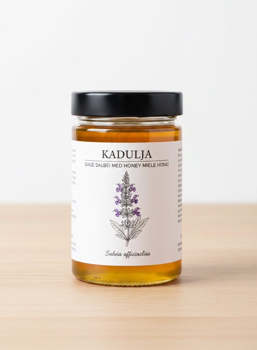 Jar of honey with a lavender design on the label, featuring the brand 'KADULJA'.