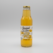 Glass bottle of orange juice with a label on a white background