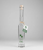 A 0.1 L miniature bottle of traditional Croatian Travarica herbal brandy infused with wild Mediterranean herbs