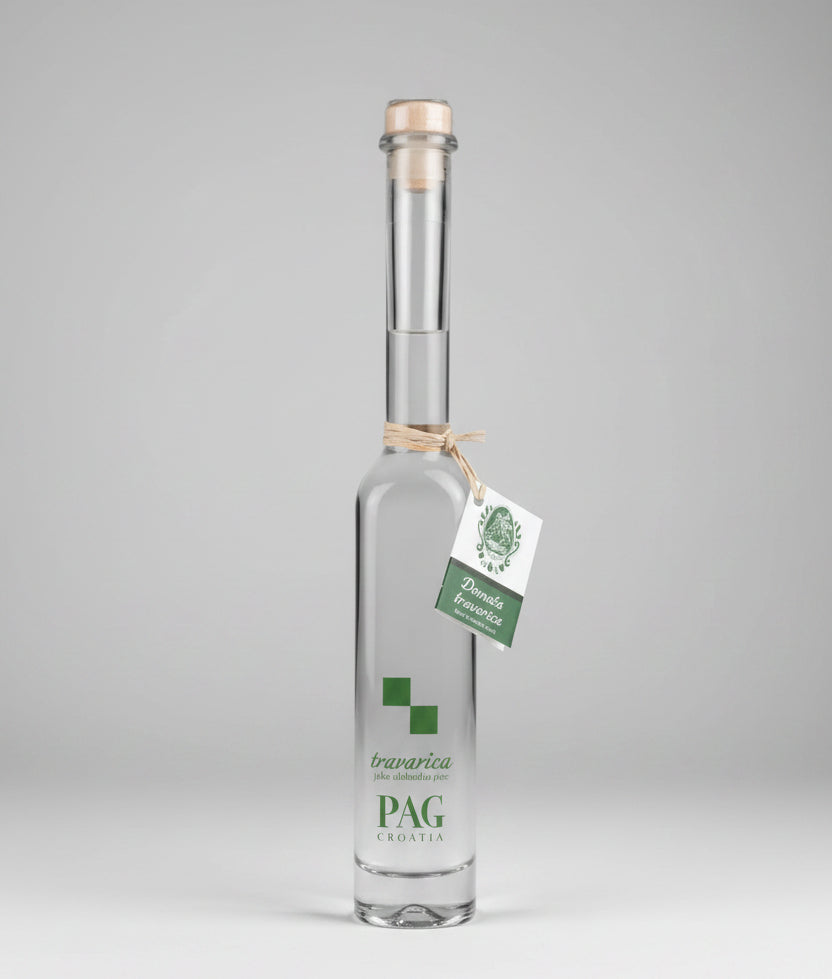 A 0.1 L miniature bottle of traditional Croatian Travarica herbal brandy infused with wild Mediterranean herbs