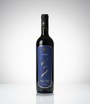 Red wine bottle with a blue label on a white background
