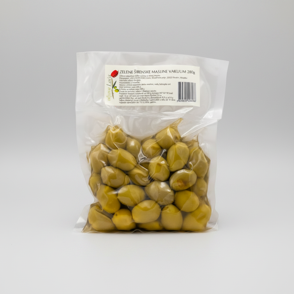 Packaged green plums with a label on a white background