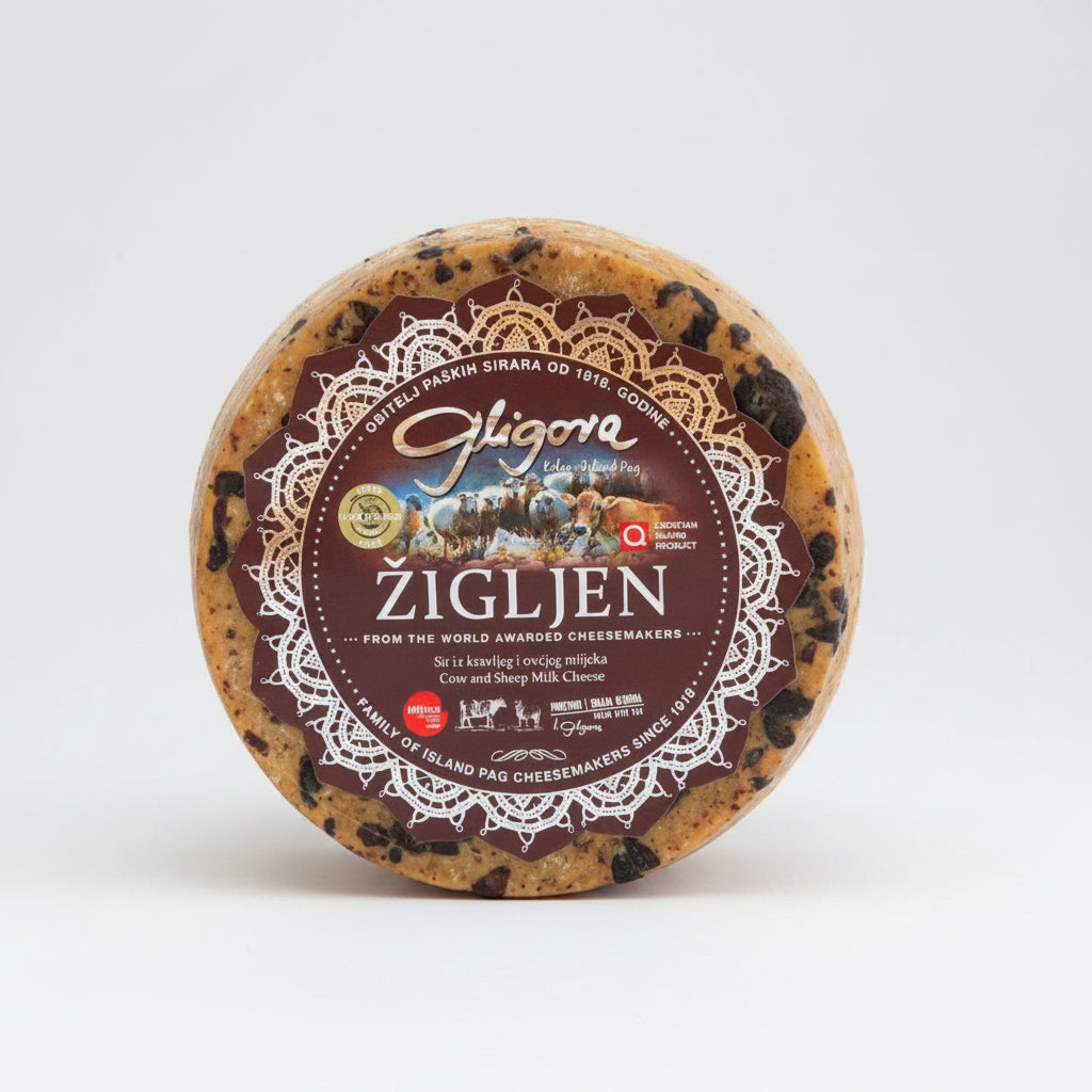 Round cheese with a Gligora label on a white background