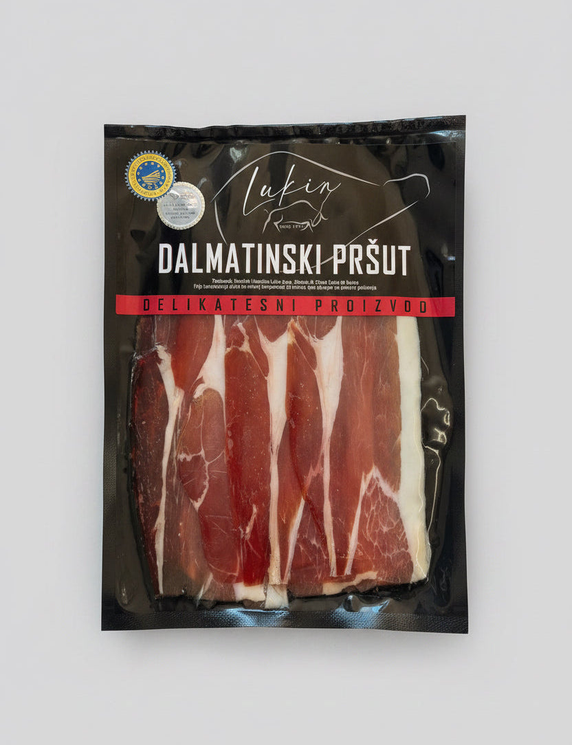 Packaged Dalmatinski Prsut with visible brand name on a light gray background