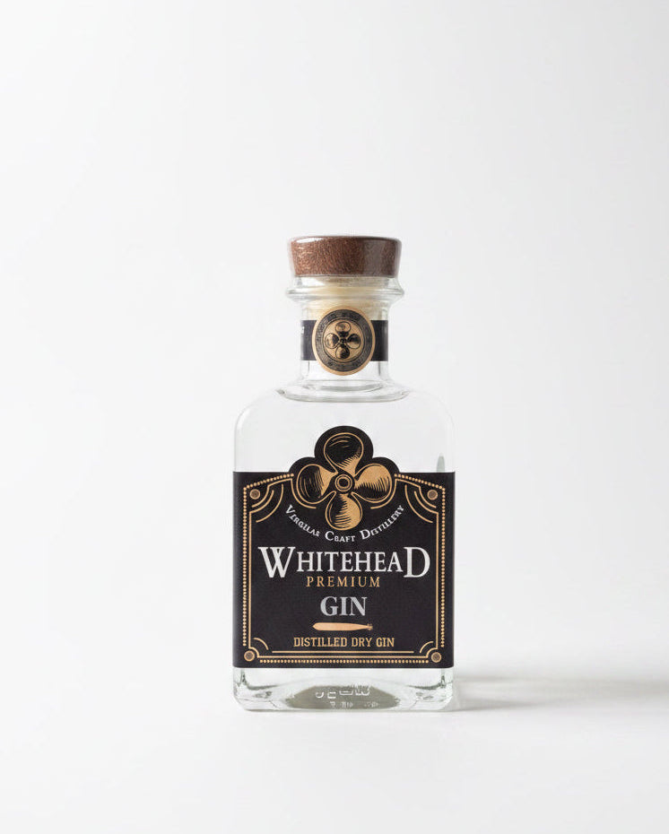Bottle of Whitehead Premium Gin on a white background