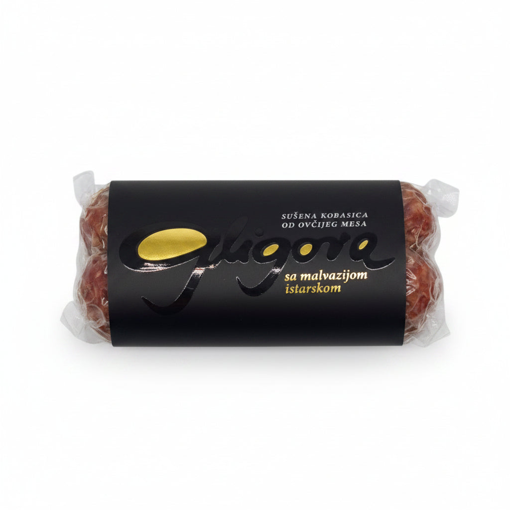 Packaged sausage with black label on a white background