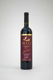 Wine bottle with Mili label on a white background