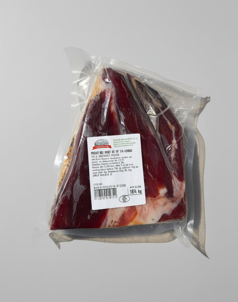 Packaged sliced meat with a label on a gray background