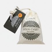 Drawstring bag with 'Solni Cvijet' branding and a tag on a white background